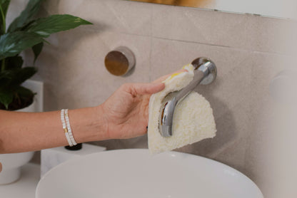 Person cleaning tap with ENJO Bathroom Mini