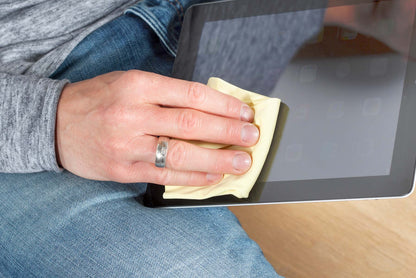Person cleaning iPad with ENJO Specs &amp; Screen 