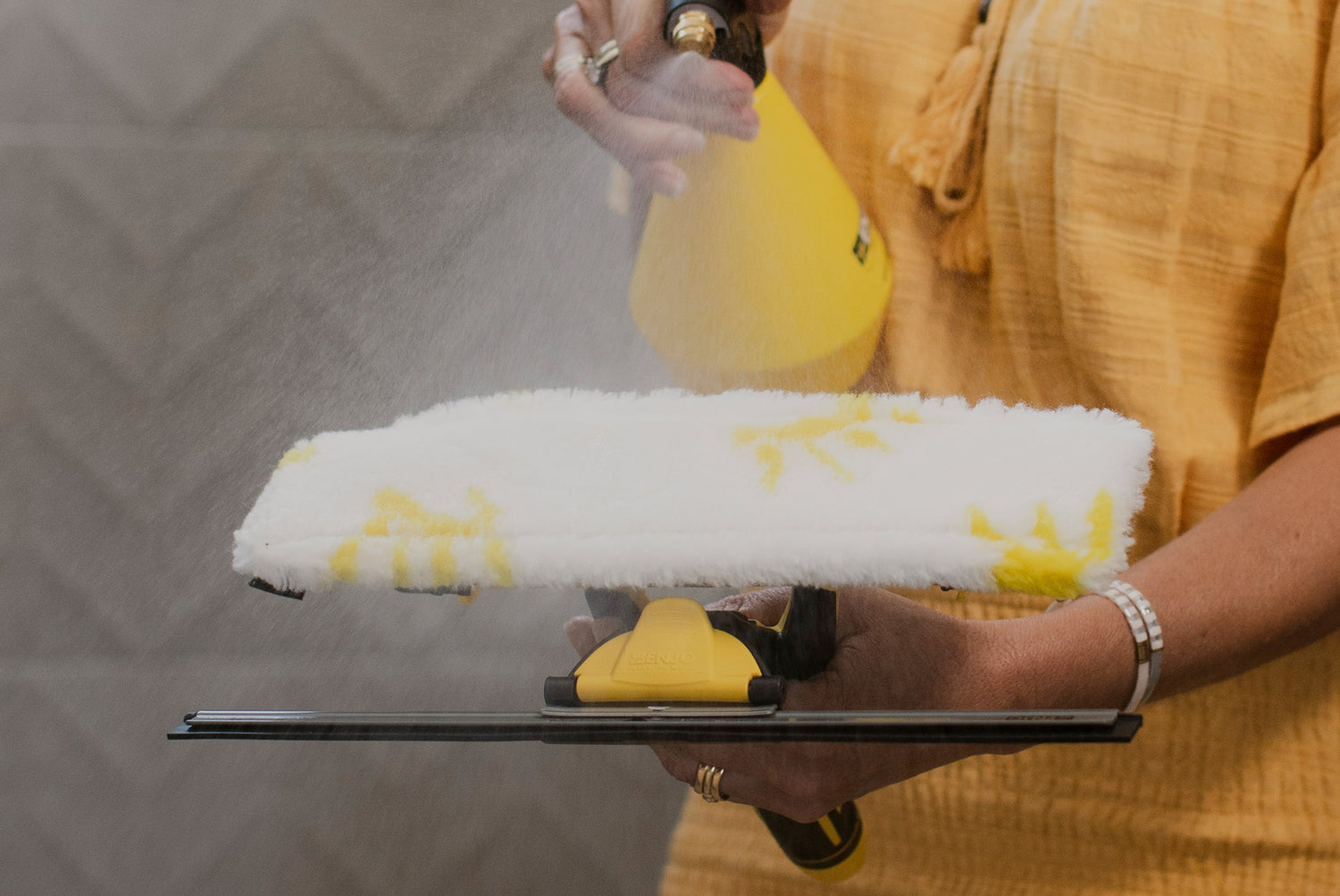 Person wetting ENJO Bathroom Multi Tool